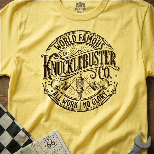Yellow t-shirt with "Knucklebuster Co. All Work No Glory" text.