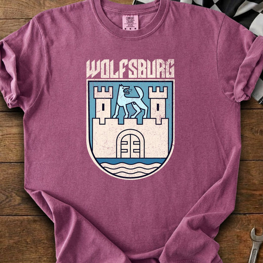T-shirt featuring the "Wolfsburg" crest with a wolf on a castle.