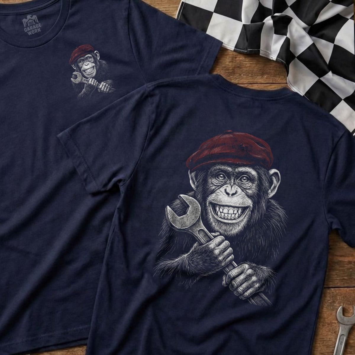 Navy t-shirts with a chimpanzee wearing a red cap holding a wrench.