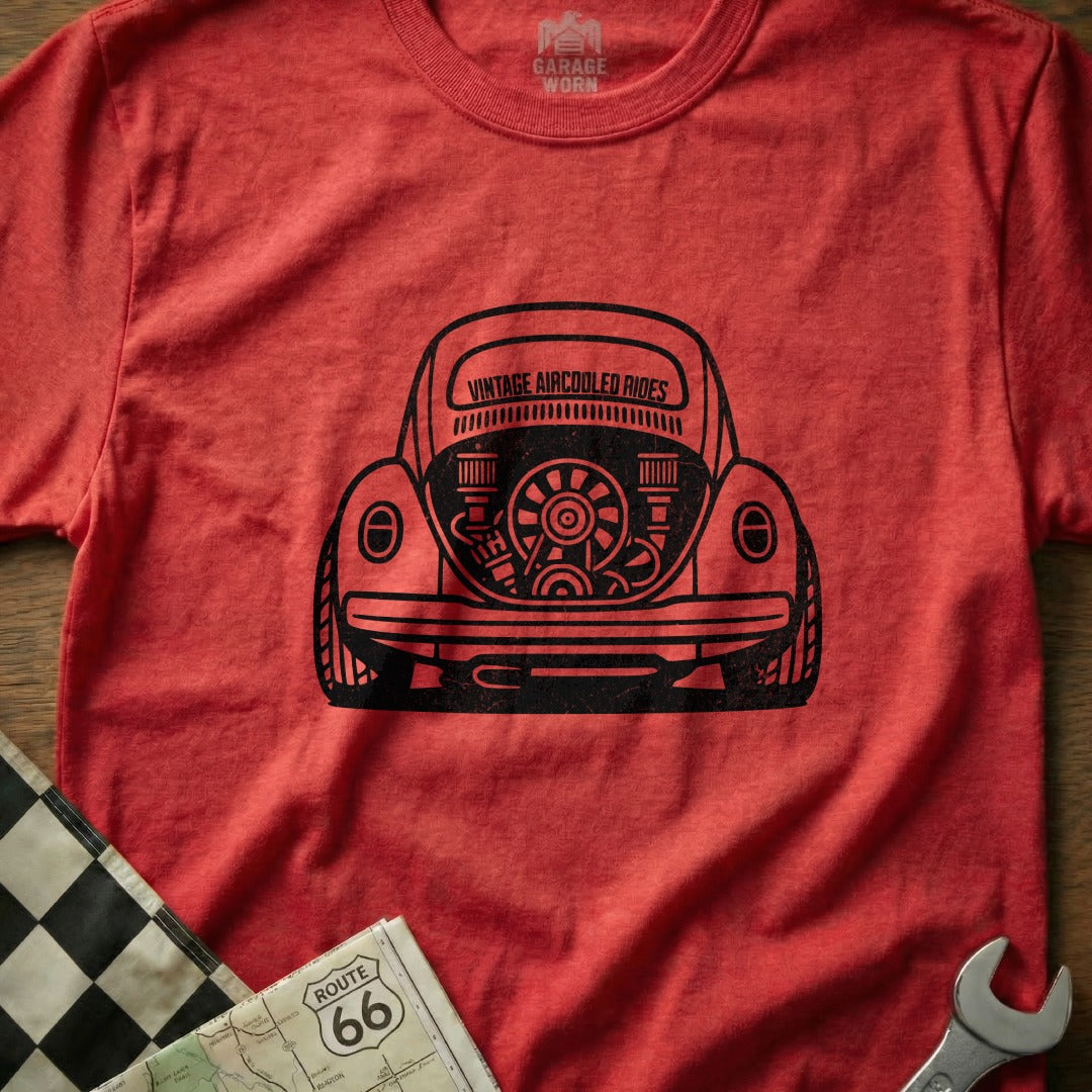 Red t-shirt with black graphic of a vintage air-cooled Volkswagen Beetle engine.