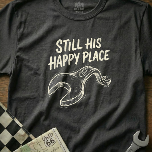 Dark t-shirt with "STILL HIS HAPPY PLACE" and a wrench graphic.