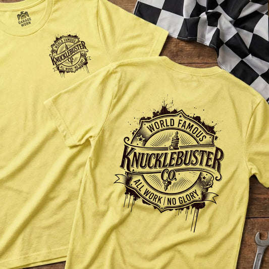 Yellow t-shirt with "Knucklebuster Co. World Famous All Work No Glory" graphic.
