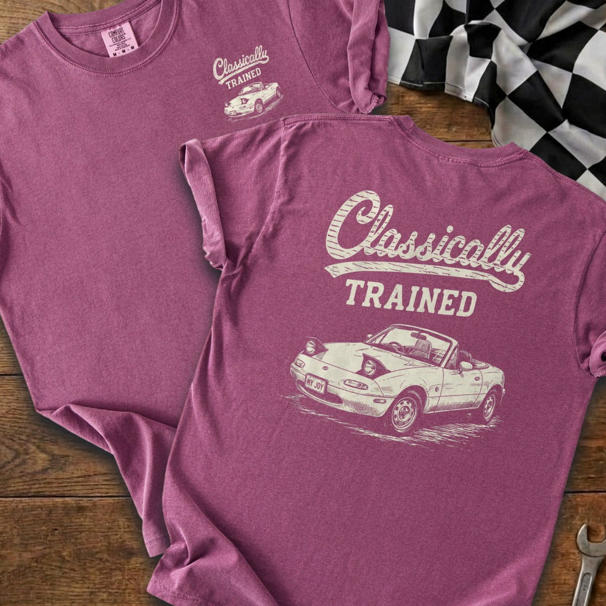 T-shirt with text "Classically TRAINED" and a drawing of a convertible sports car.