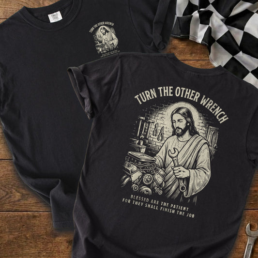 Jesus holding a wrench with engine and tools, "Turn the other wrench" text.