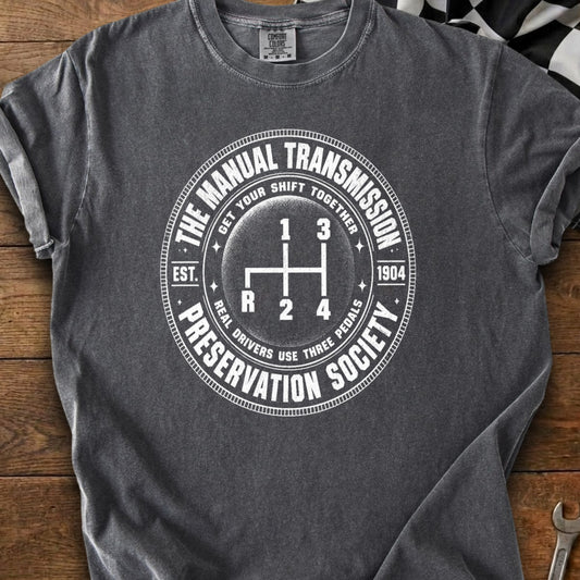 Gray t-shirt with "The Manual Transmission Preservation Society" and gear shift graphic.