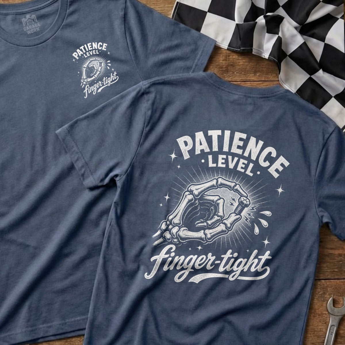 Two blue t-shirts with white graphic of skeleton hand tightening a bolt, text reads "Patience Level Finger-tight".
