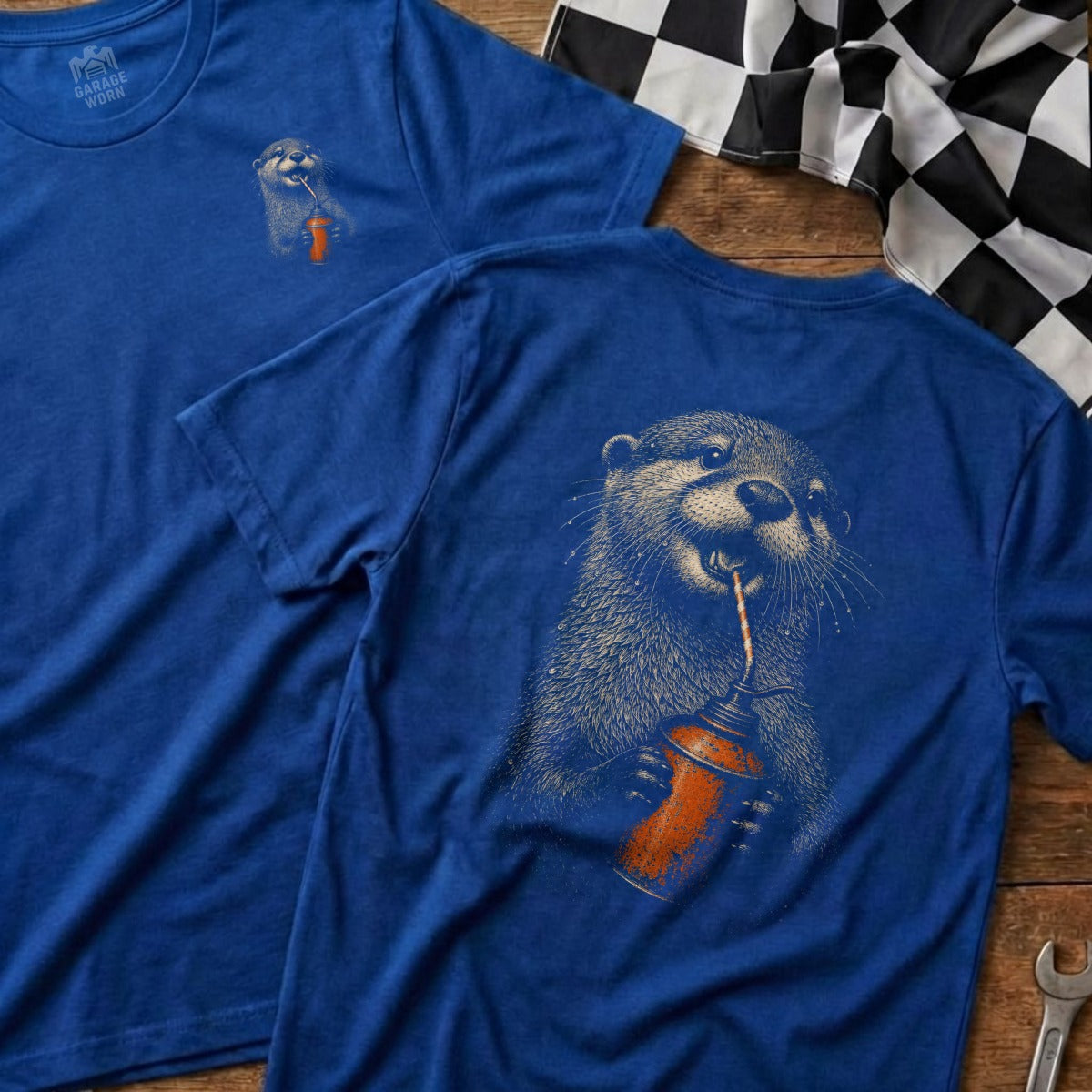 Blue t-shirt with an otter drinking from an oil can graphic.