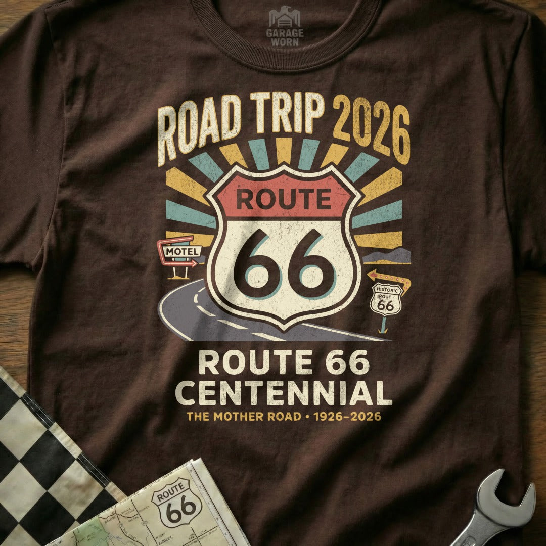 Brown t-shirt with "Route 66 Centennial" and "Road Trip 2026" graphics.