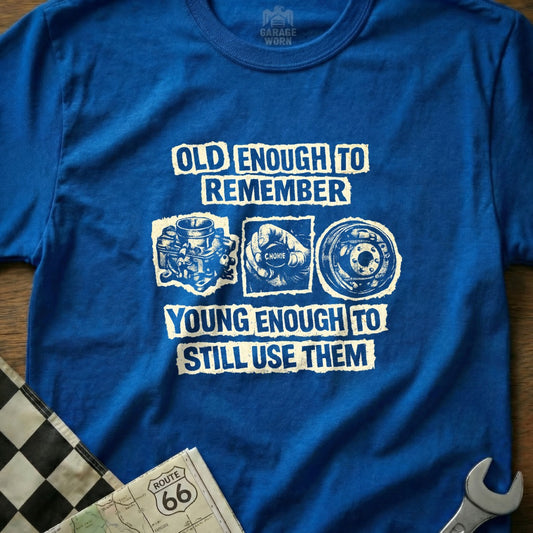 Blue t-shirt with "Old Enough to Remember, Young Enough to Still Use Them" text.