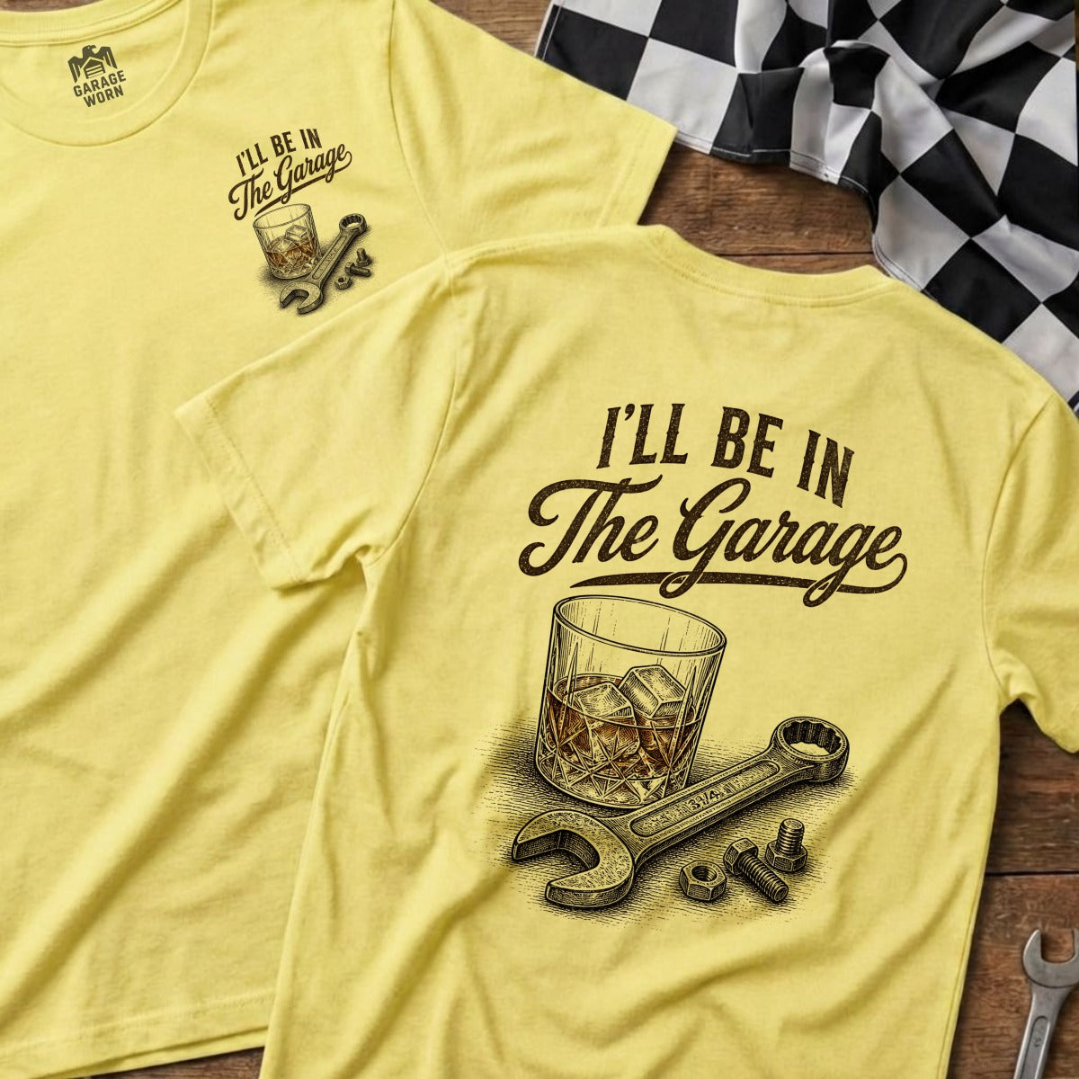 Yellow t-shirt with "I'll Be In The Garage" text and whiskey glass with wrench.