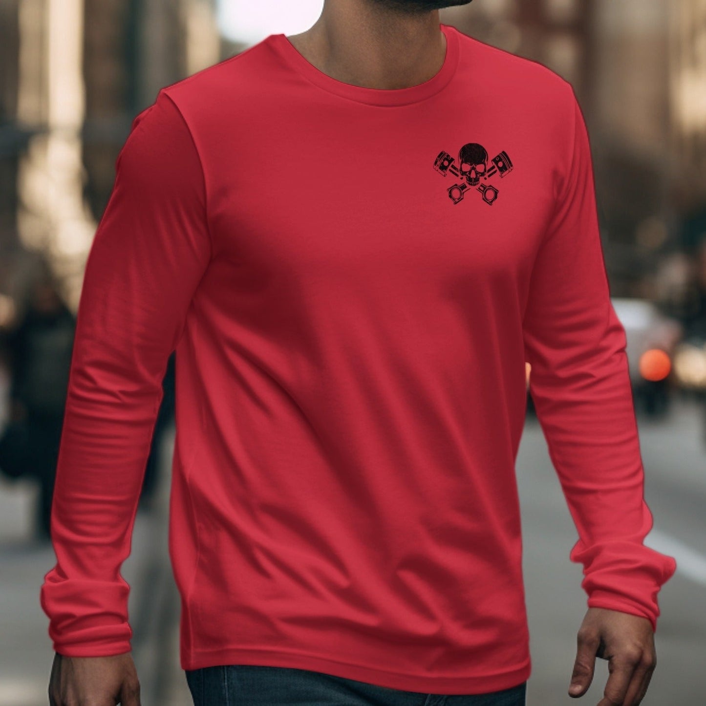 Red long-sleeve shirt with crossed pistons and skull graphic on chest.
