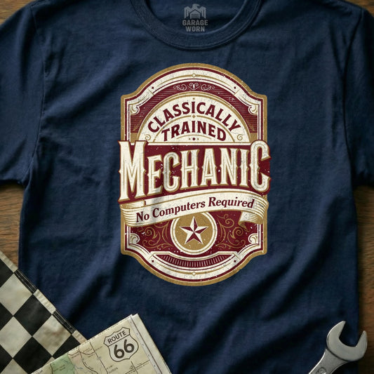Navy t-shirt with "Classically Trained Mechanic No Computers Required" emblem.