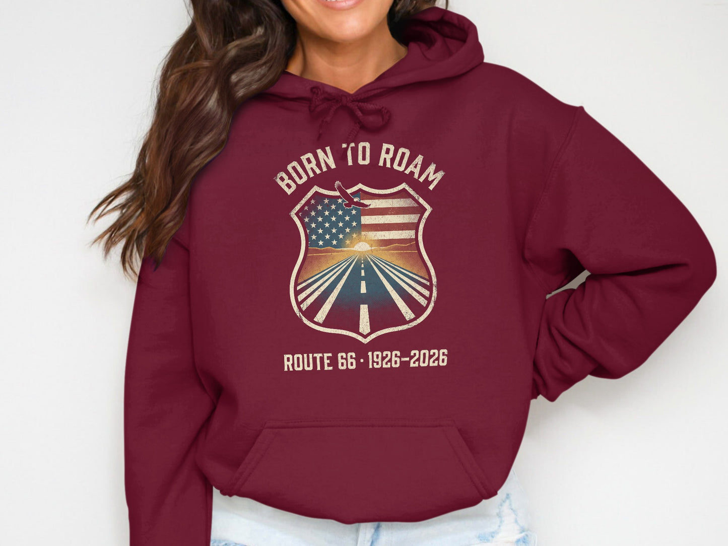 Maroon hoodie with "Born to Roam Route 66" shield graphic featuring American flag.