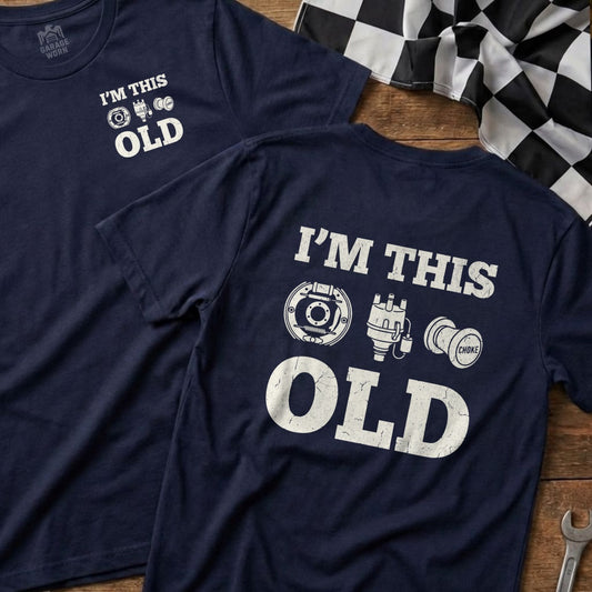 Navy t-shirt with "I'm This Old" graphic and automotive parts.