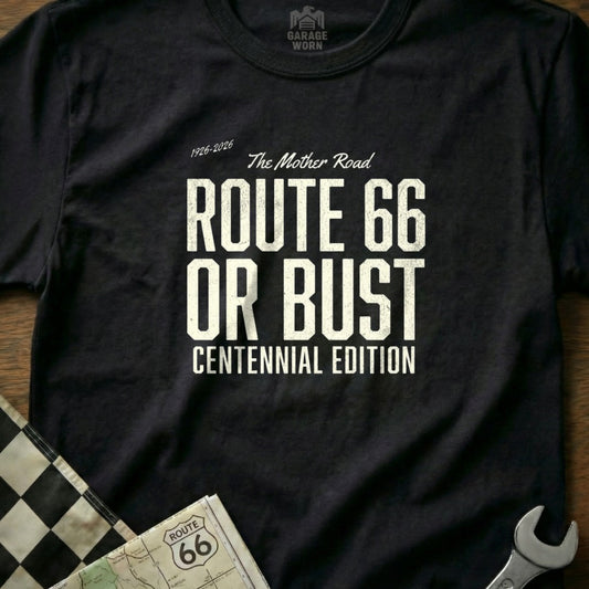 Black t-shirt with "Route 66 Or Bust Centennial Edition" text.