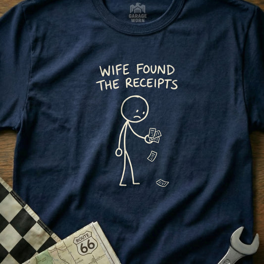 Navy t-shirt with stick figure holding receipts, "WIFE FOUND THE RECEIPTS" text.