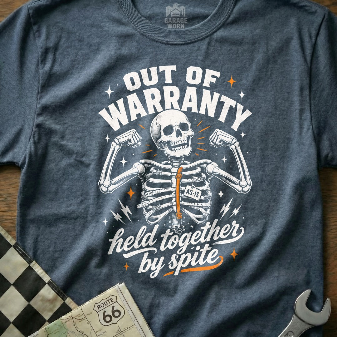 T-shirt graphic: skeleton, "Out of Warranty," "AS-IS," "Held Together By Spite."