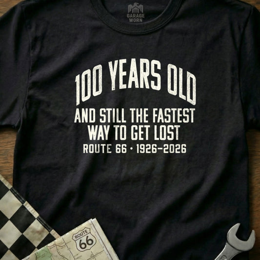 Black t-shirt with "100 Years Old and Still the Fastest Way to Get Lost Route 66 1926-2026".