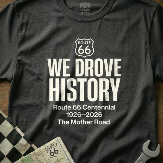 Dark t-shirt with Route 66 Centennial "We Drove History" graphic.