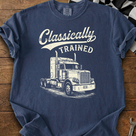 Navy t-shirt with illustration of a classic semi-truck and text "Classically TRAINED".