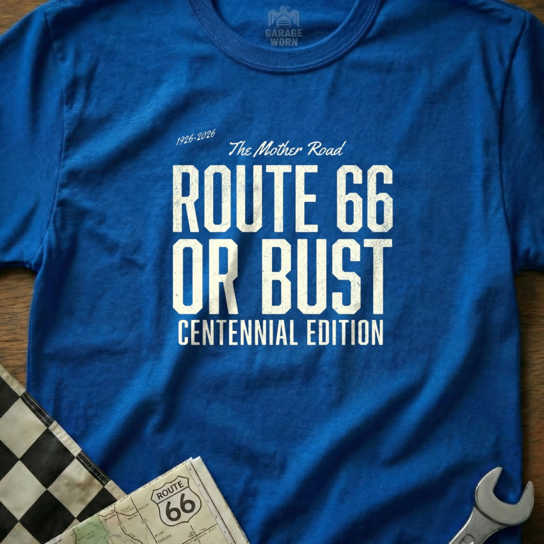 Blue t-shirt with "Route 66 Or Bust Centennial Edition" text.