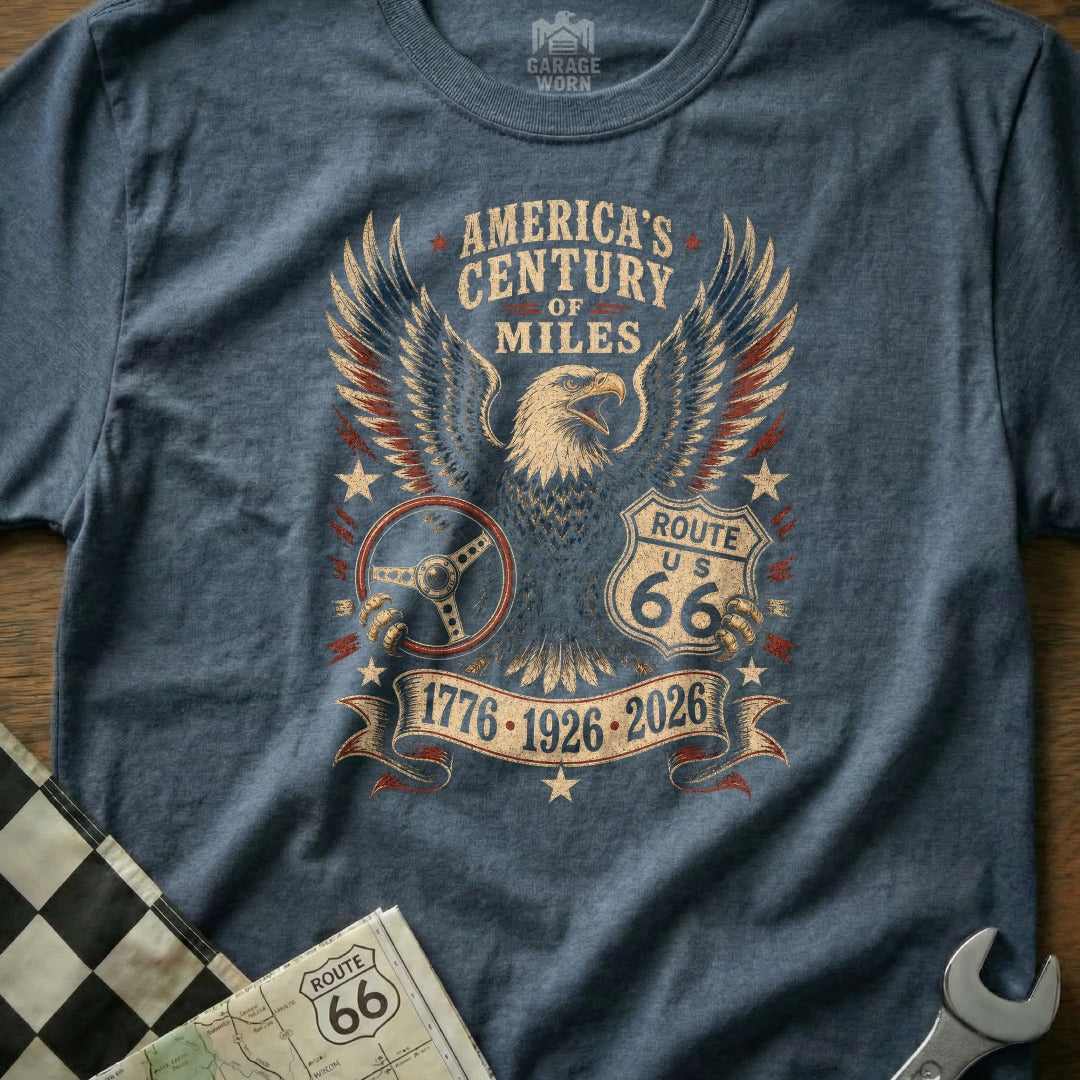Eagle and steering wheel graphic with "America's Century of Miles" text on a t-shirt.