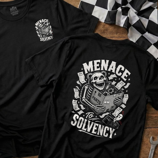 Black t-shirt with skeleton bear holding "PARTS" box, surrounded by bills.