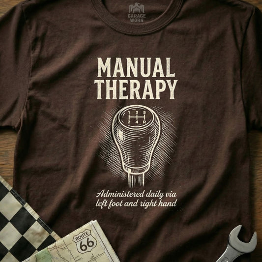 Brown t-shirt with "Manual Therapy" and gear shift design.