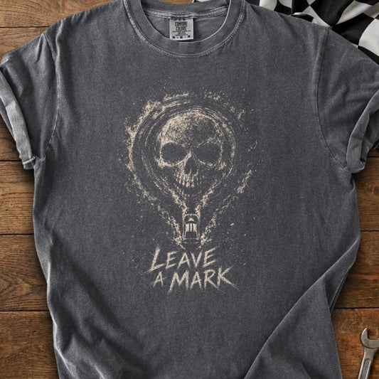 T-shirt with skull design and text "LEAVE A MARK"