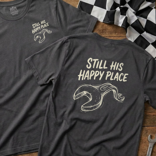 Dark grey t-shirt with "Still His Happy Place" and wrench graphic.