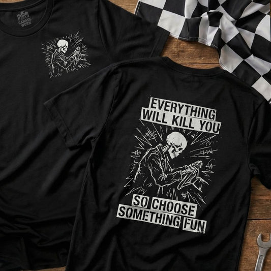 Skeleton driving a car on a black t-shirt with text: "Everything will kill you, so choose something fun."