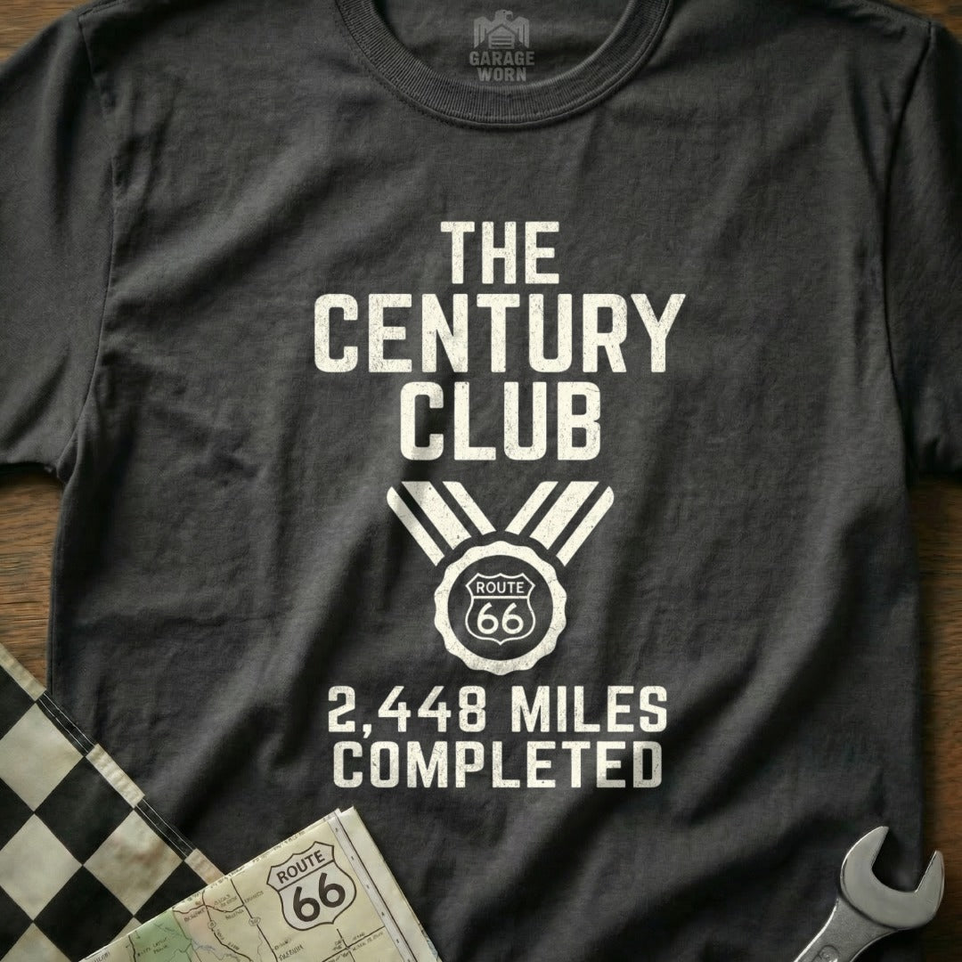 T-shirt with "The Century Club" and "2,448 Miles Completed" text.