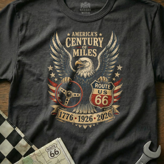 T-shirt graphic with eagle, Route 66, and "America's Century of Miles 1776-1926-2026."