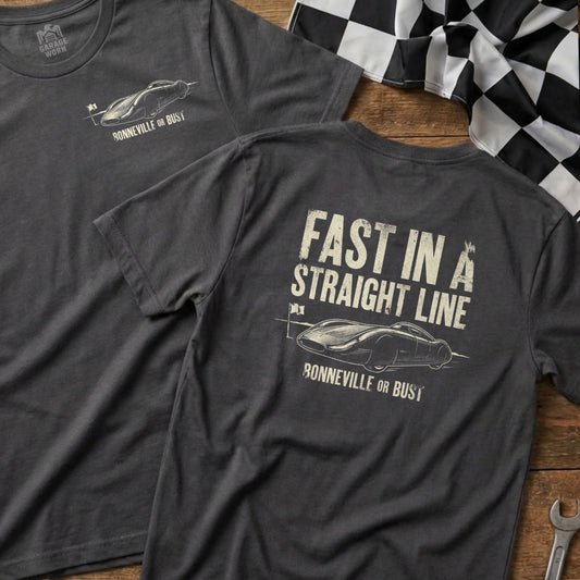 Dark gray t-shirt with a vintage race car graphic and "FAST IN A STRAIGHT LINE" text.