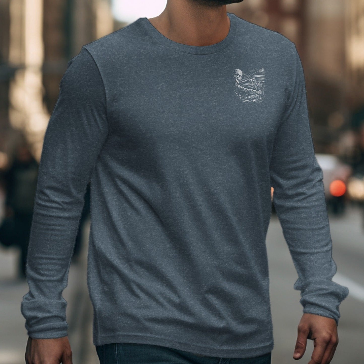 Long sleeve shirt with a skeleton driving a car chest graphic