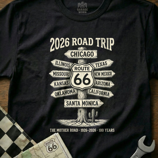 Black t-shirt with "2026 Road Trip Route 66" and directional signs.