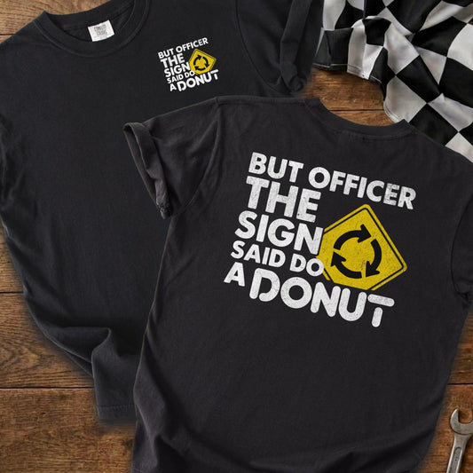 Black t-shirt with "But officer the sign said do a donut" text and graphic.
