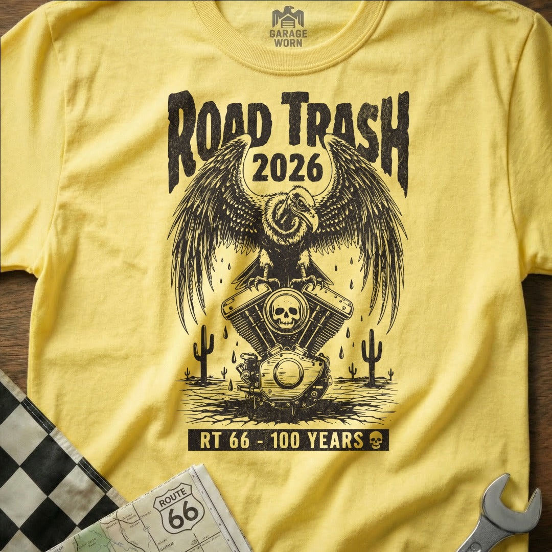 Yellow t-shirt with Road Trash 2026 and Route 66 - 100 Years motorcycle graphic.