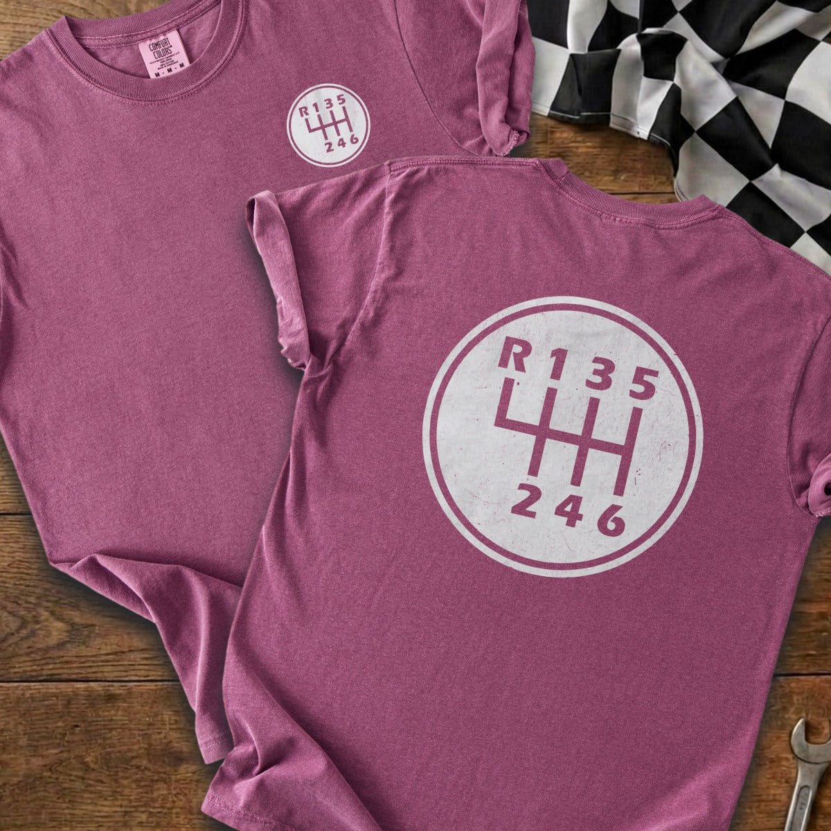 Maroon t-shirt with white gear shift graphic on back and front.