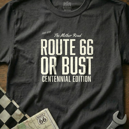 Dark t-shirt with "Route 66 Or Bust Centennial Edition" text, "The Mother Road" above.