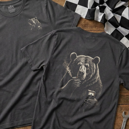 T-shirt featuring a realistic illustration of a smoking bear holding a gauge.