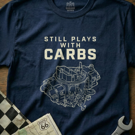 Navy t-shirt with "Still Plays With Carbs" and a drawing of a carburetor.