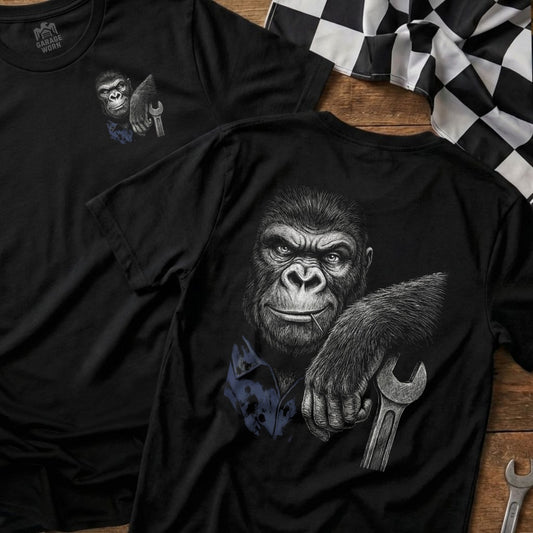 Black t-shirt with a distressed graphic of a gorilla holding a wrench.