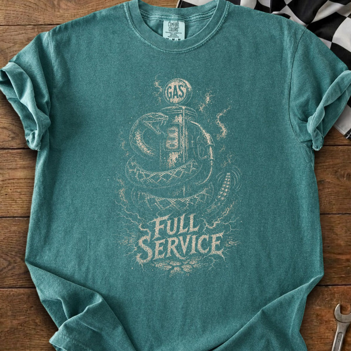 Teal t-shirt with a snake coiled around a vintage gas pump, featuring "FULL SERVICE" text.