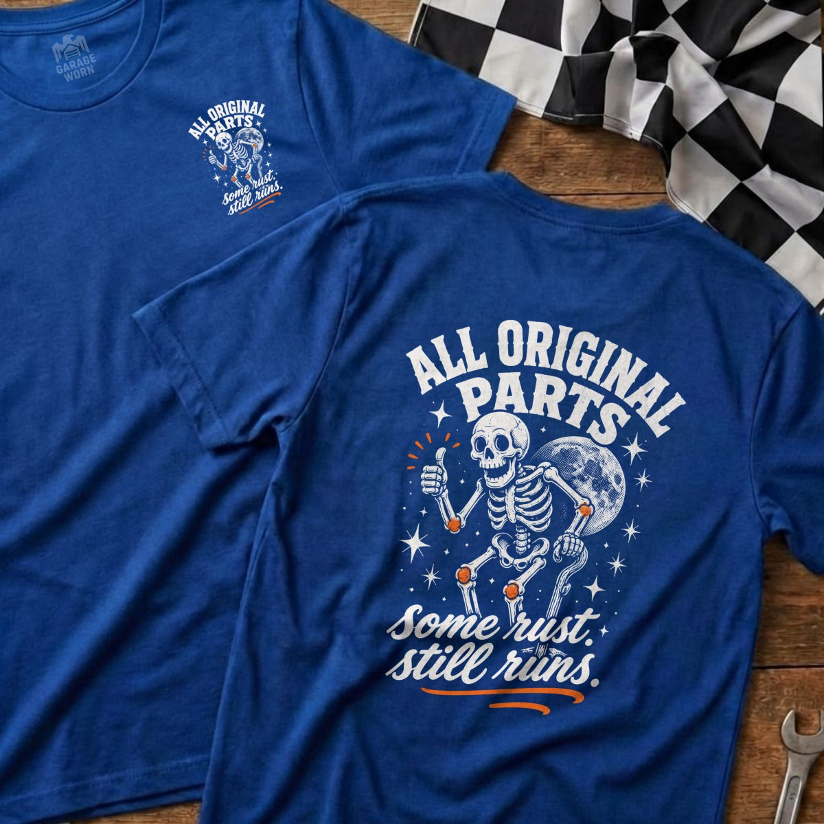 T-shirt with skeleton, moon, and text "All Original Parts. Some rust. Still runs."