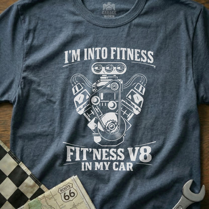 Graphic t-shirt with "I'm Into Fitness Fit'ness V8 In My Car" text and engine illustration.