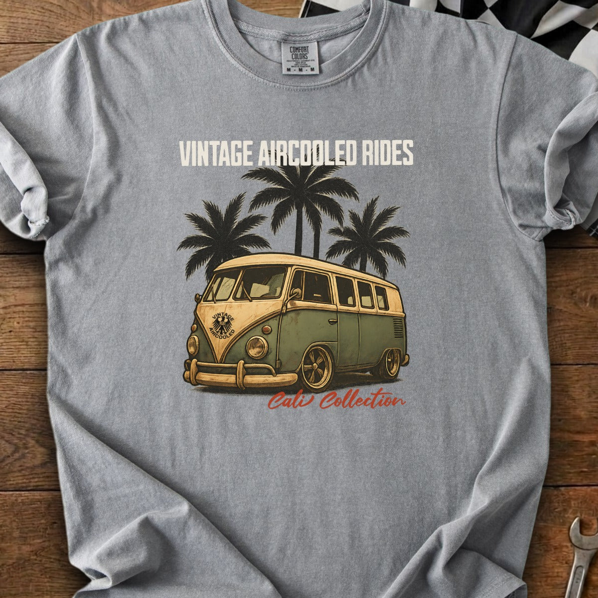 Grey t-shirt with vintage van, palm trees, and text "VINTAGE AIRCOOLED RIDES" and "Cali Collection".