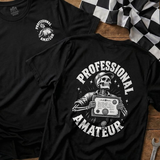 Black t-shirt graphic of a skeleton in a hat holding a certificate, with text "PROFESSIONAL AMATEUR".