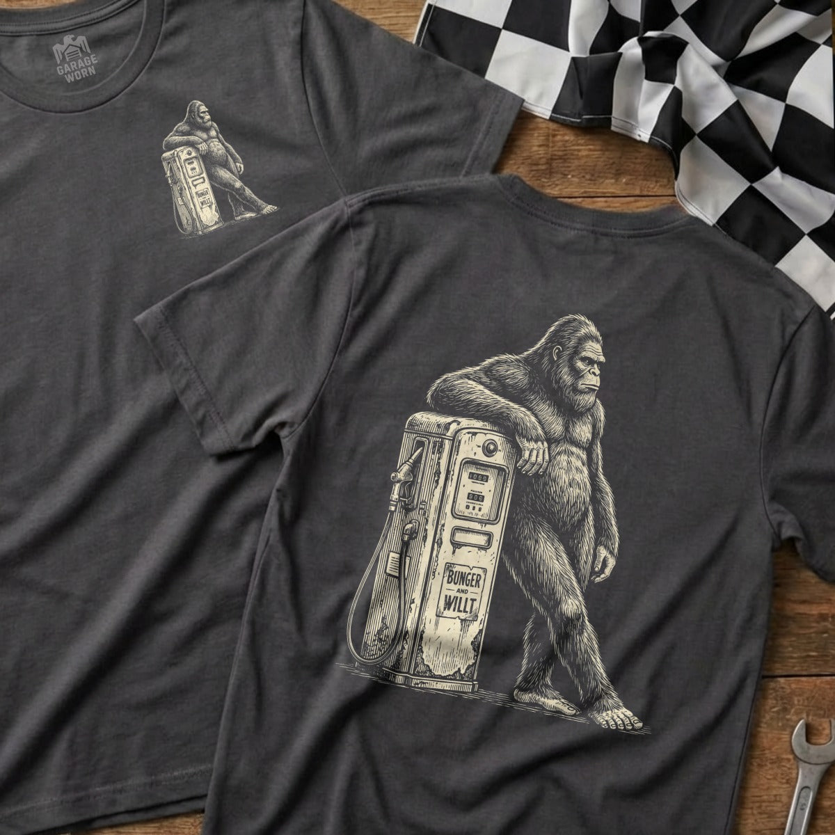 Dark grey t-shirt with Bigfoot leaning on a vintage gas pump.