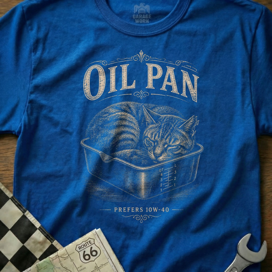 Blue t-shirt with a sleeping cat in an oil pan, "Oil Pan" text above, and "Prefers 10W-40" below.